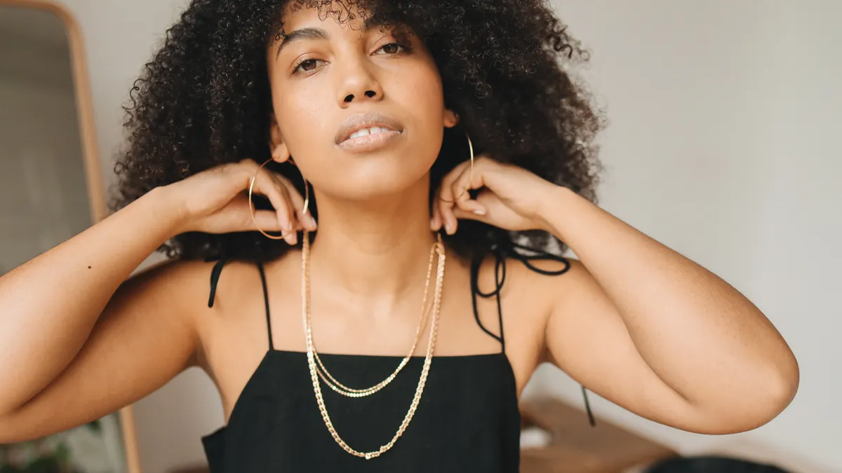 Necklace chains and lengths — The Complete Guide woman wearing layered necklaces